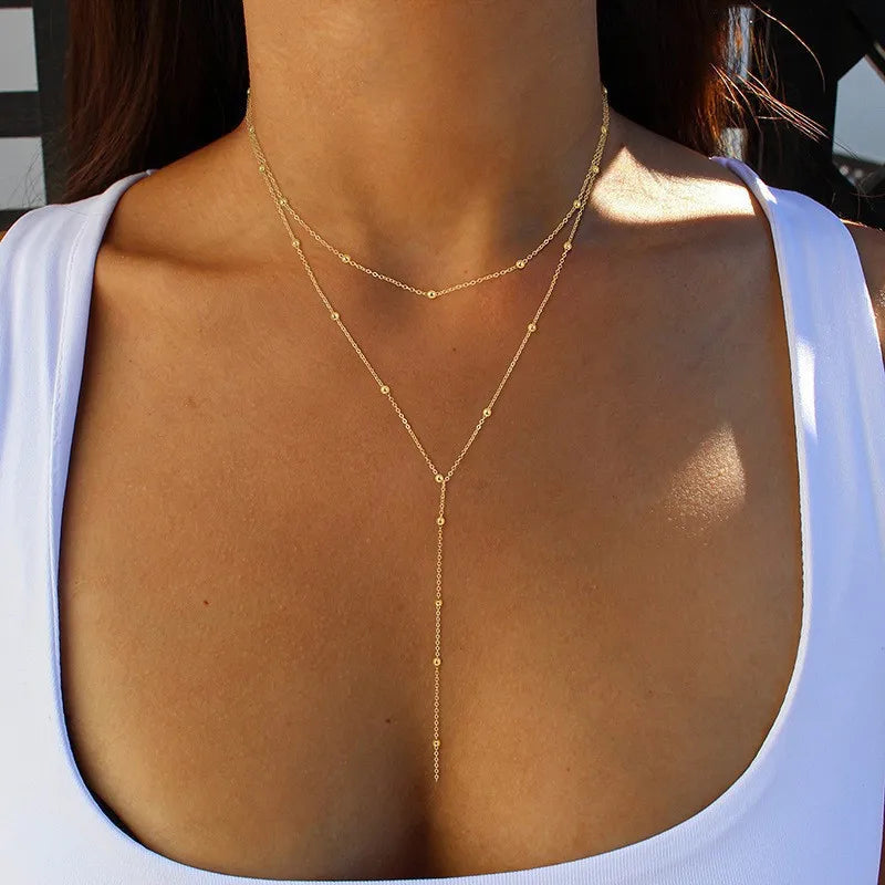 Geometric Tassel Bead Necklace – Minimal Collarbone